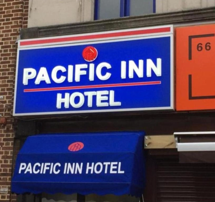 Pacific Inn London Heathrow exterior sign at 60-66 The Broadway, Southall